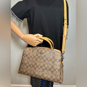 Coach satchel top handle purse/bag, never been worn or used.